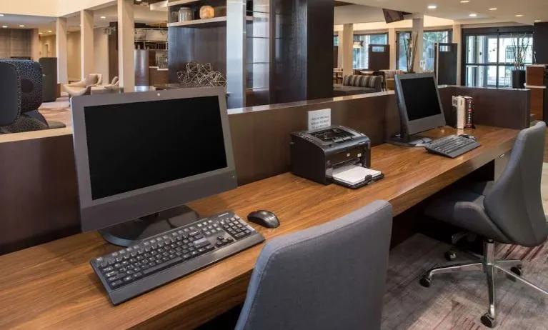 Business center with computers, printer and ergonomic chairs at Sonesta Select Seattle Bellevue Redmond.