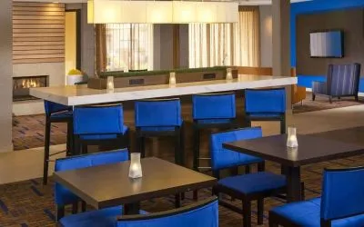 Dining area and workspace, perfect for coworking at Sonesta Select Charlotte University Research Park.