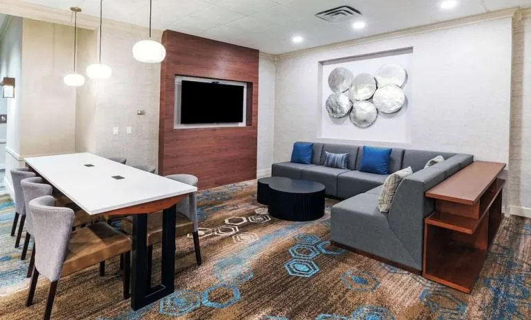 Lobby and coworking lounge at DoubleTree By Hilton Tulsa-Downtown.

