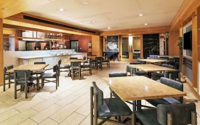 Dining area perfect for coworking at DoubleTree By Hilton Tulsa-Downtown.

