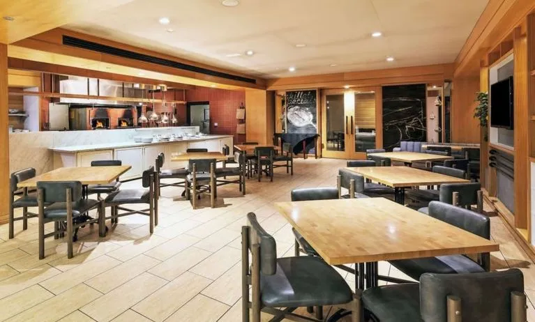 Dining area perfect for coworking at DoubleTree By Hilton Tulsa-Downtown.

