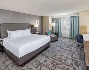 Day use room with work desk at DoubleTree By Hilton Tulsa-Downtown.

