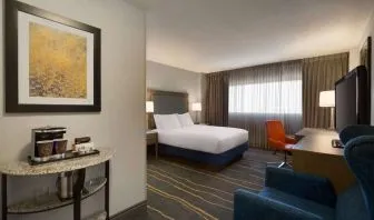 Day use room with work desk, lounger and coffee machine at DoubleTree By Hilton Albuquerque.
