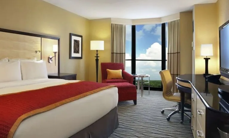 Beautiful king suite with TV, work desk and a lovely view at Hilton Rosemont/Chicago O'Hare.