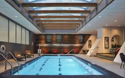 Bright-lit indoor pool at Palmer House A Hilton Hotel.