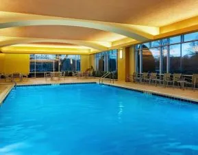 Refreshing indoor pool at Embassy Suites By Hilton Hampton Convention Center.