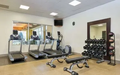 Fitness center at Embassy Suites By Hilton Hampton Convention Center.