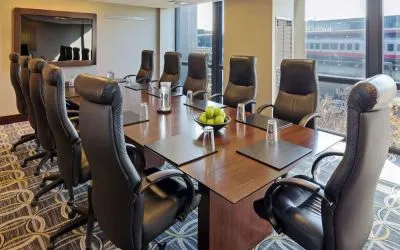 Bright-lit meeting room at Hilton Chicago O'Hare Airport.