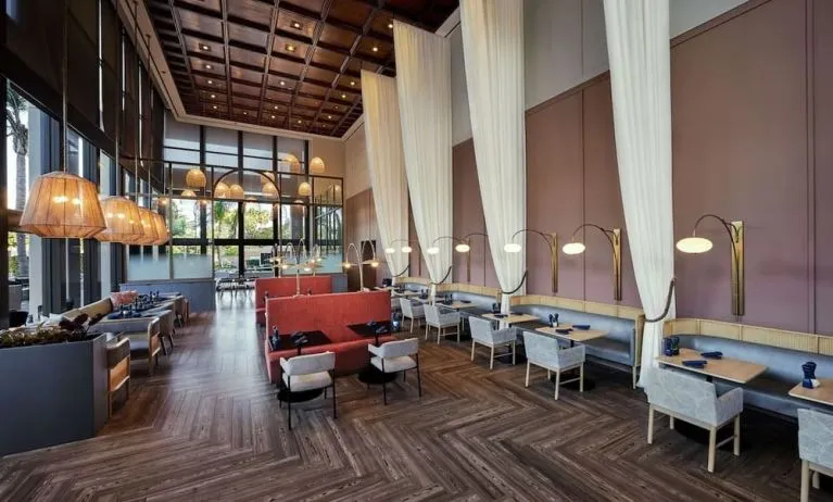 Breakfast area with natural light perfect for coworking at Hotel Fera Anaheim, A DoubleTree By Hilton.