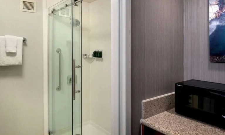 Private guest bathroom with shower at Sonesta Select Boston Milford.