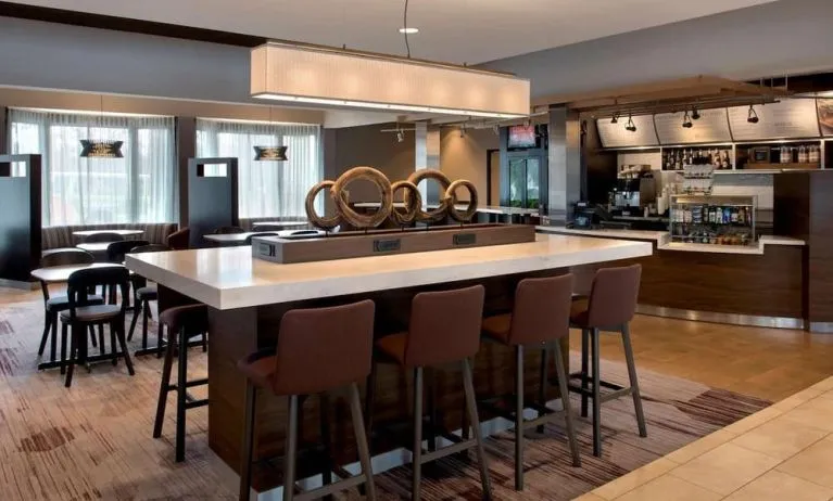 Dining area and workspace at Sonesta Select Boston Milford.