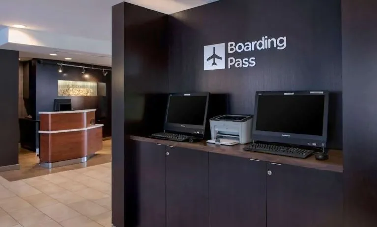 Business center with computers and printer at Sonesta Select Boston Milford.