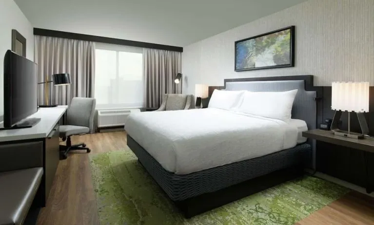 Day use room with work desk and natural light at Hilton Garden Inn Memphis Downtown.