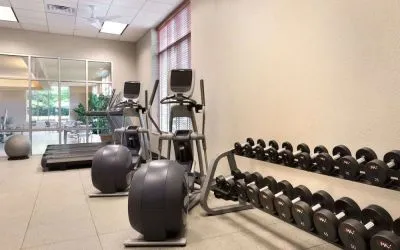 Fitness center at Embassy Suites By Hilton Nashville South Cool Springs.
