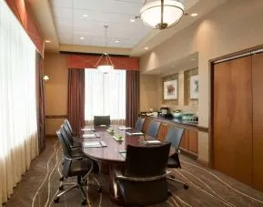 Bright-lit meeting room at Embassy Suites By Hilton Nashville South Cool Springs.