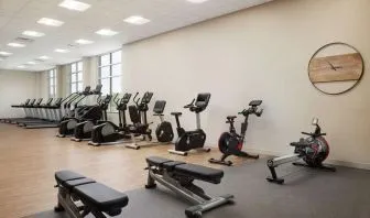 Fully-equipped fitness center at Hilton Charlotte Airport.
