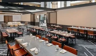 Dining area perfect for coworking at Hilton Charlotte Airport.

