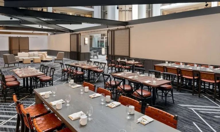 Dining area perfect for coworking at Hilton Charlotte Airport.
