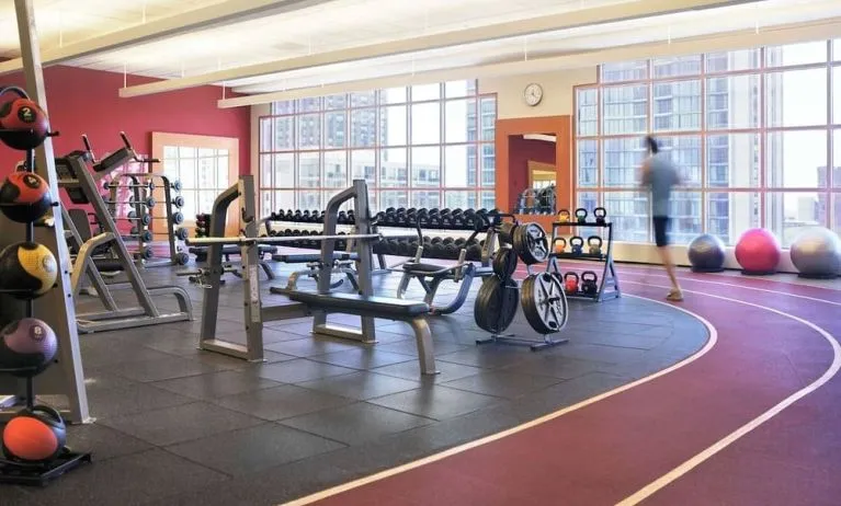 Fully-equipped fitness center at Hilton Chicago.
