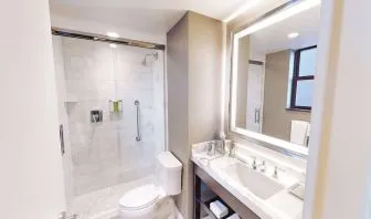 Guest bathroom with shower at Hilton Chicago.