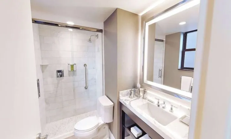Guest bathroom with shower at Hilton Chicago.