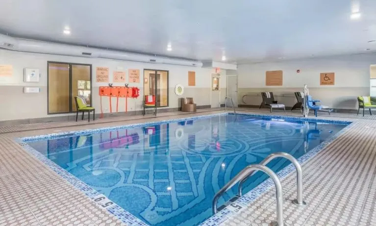 Refreshing indoor pool at The Leo Collection, An Ascend Collection Hotel.