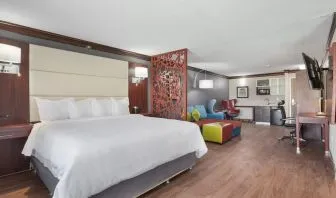 Day use room with living area at The Leo Collection, An Ascend Collection Hotel.