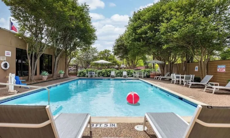 Relaxing outdoor pool at Doubletree By Hilton Houston Medical Center Hotel & Suites.