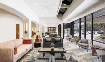 Lobby and coworking lounge at Doubletree By Hilton Houston Medical Center Hotel & Suites.