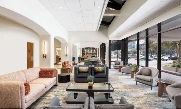 Lobby and coworking lounge at Doubletree By Hilton Houston Medical Center Hotel & Suites.