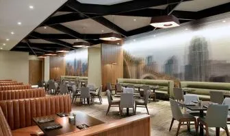 Dining area with comfortable seating at Hilton Minneapolis.