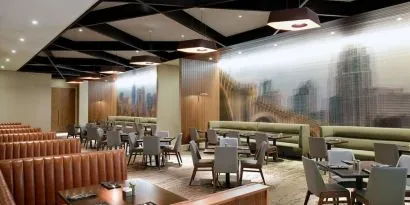 Dining area with comfortable seating at Hilton Minneapolis.