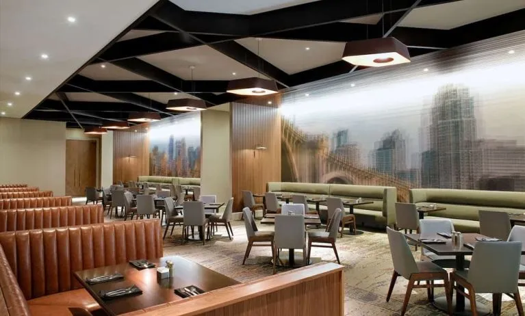 Dining area with comfortable seating at Hilton Minneapolis.