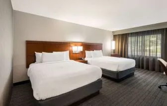 Bright and spacious day use twin room with work desk at Sonesta Select San Jose Airport.