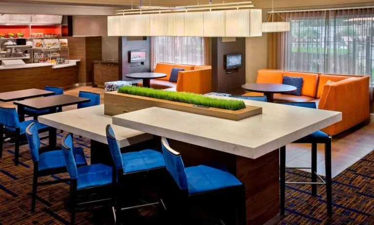 Dining area and workspace at Sonesta Select Boston Danvers.
