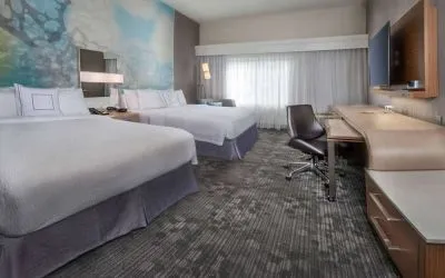 Bright and spacious day use twin room with work desk and private bathroom at Sonesta Select Allentown Bethlehem Airport.