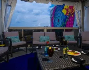 Furniture in rooftop perfect for coworking at Beacon Hotel.