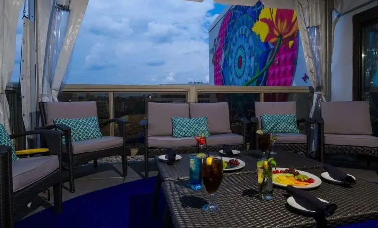 Furniture in rooftop perfect for coworking at Beacon Hotel.