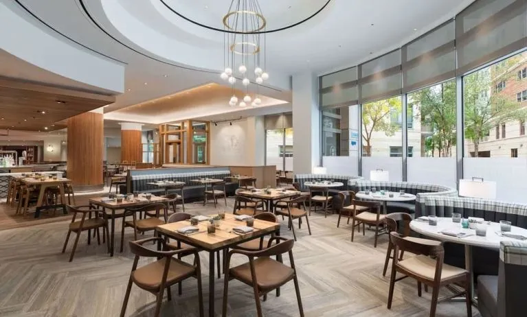 Dining area with natural light perfect for coworking at The Westin Arlington Gateway.