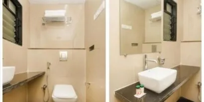 Guest bathroom with shower at THE BEST HOTEL MUMBAI.