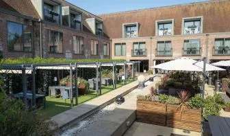 Hotel terrace and garden at Hilton London Syon Park.