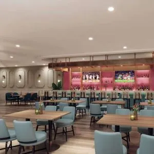 Hotel bar with lounge area at Sonesta Miami Airport.