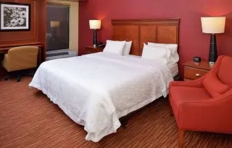 Day use room with work desk and sofa at Hampton Inn Columbus-East.