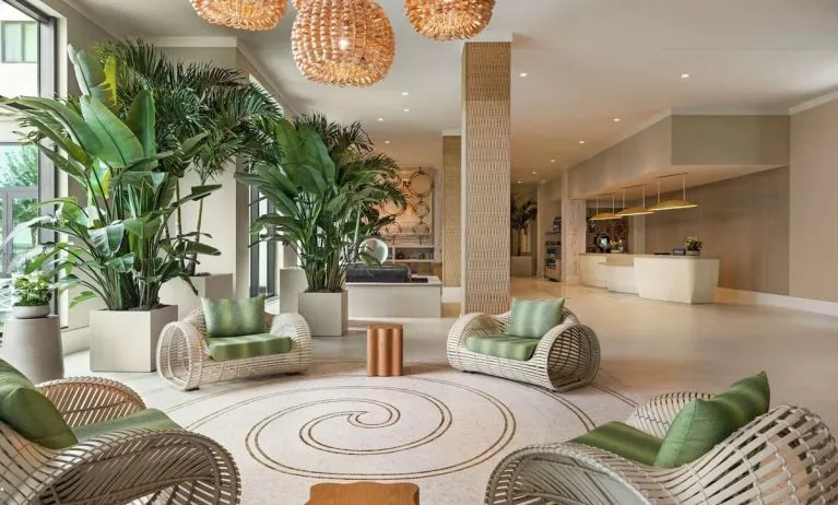 Beautiful lobby lounge at Embassy Suites By Hilton Panama City Beach Resort.