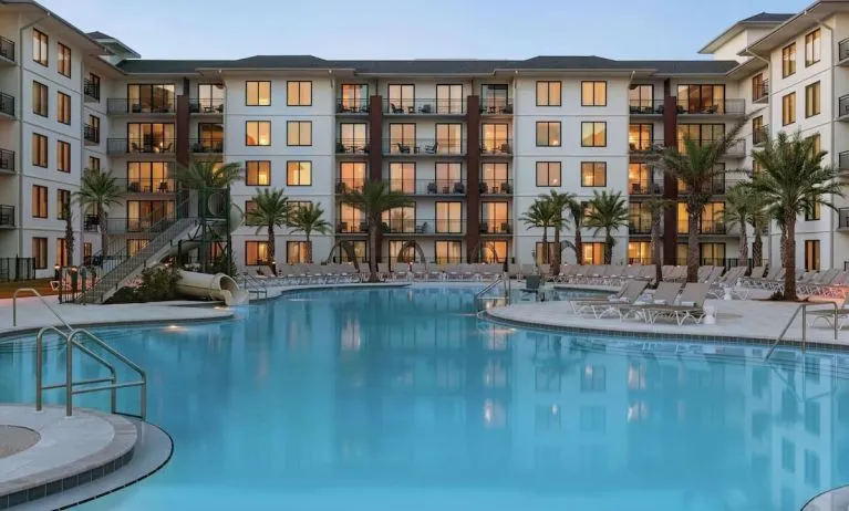 Outdoor pool at Embassy Suites By Hilton Panama City Beach Resort.