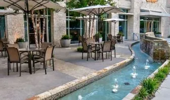 Alfresco dining perfect for coworking at Hilton Dallas/ Plano Granite Park.
