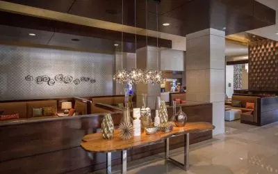 Lobby and coworking lounge at Hilton Dallas/ Plano Granite Park.
