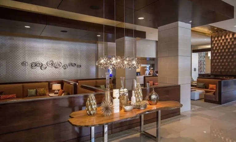 Lobby and coworking lounge at Hilton Dallas/ Plano Granite Park.