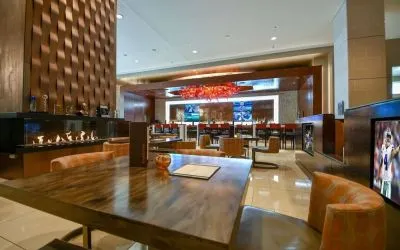 Dining area perfect for coworking at Hilton Dallas/ Plano Granite Park.