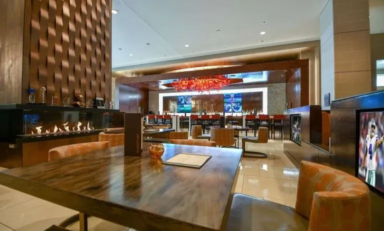 Dining area perfect for coworking at Hilton Dallas/ Plano Granite Park.
